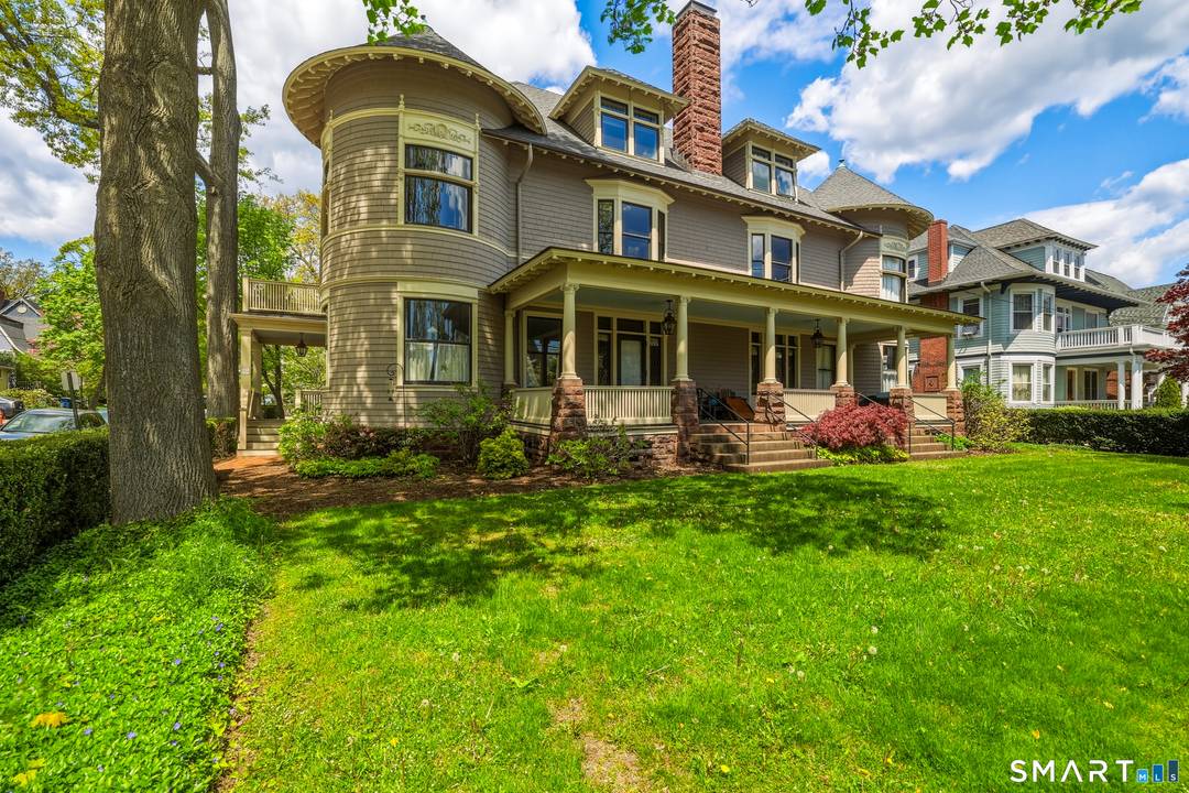 One of a kind this elegant single level condo located in an historic Tilton House building combines classic features with modern, open concept living.
