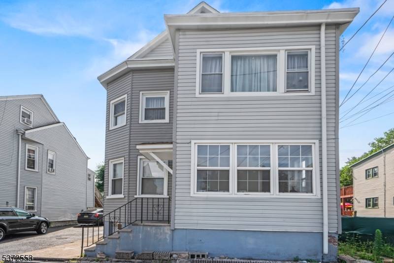 WELCOME TO THIS 2 FAMILY HOME IN A PRIME LOCATION OF PATERSON !