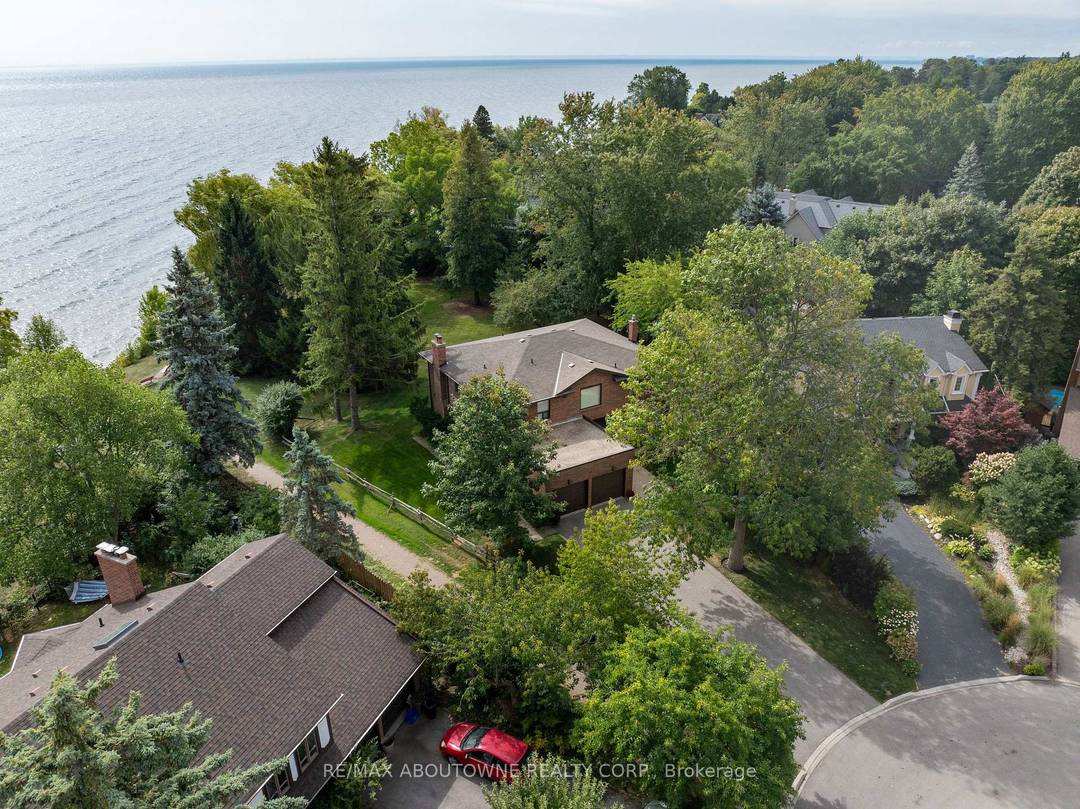 Unobstructed Lake Ontario views define this rare opportunity in South East Oakville's prestigious Arkendo enclave.