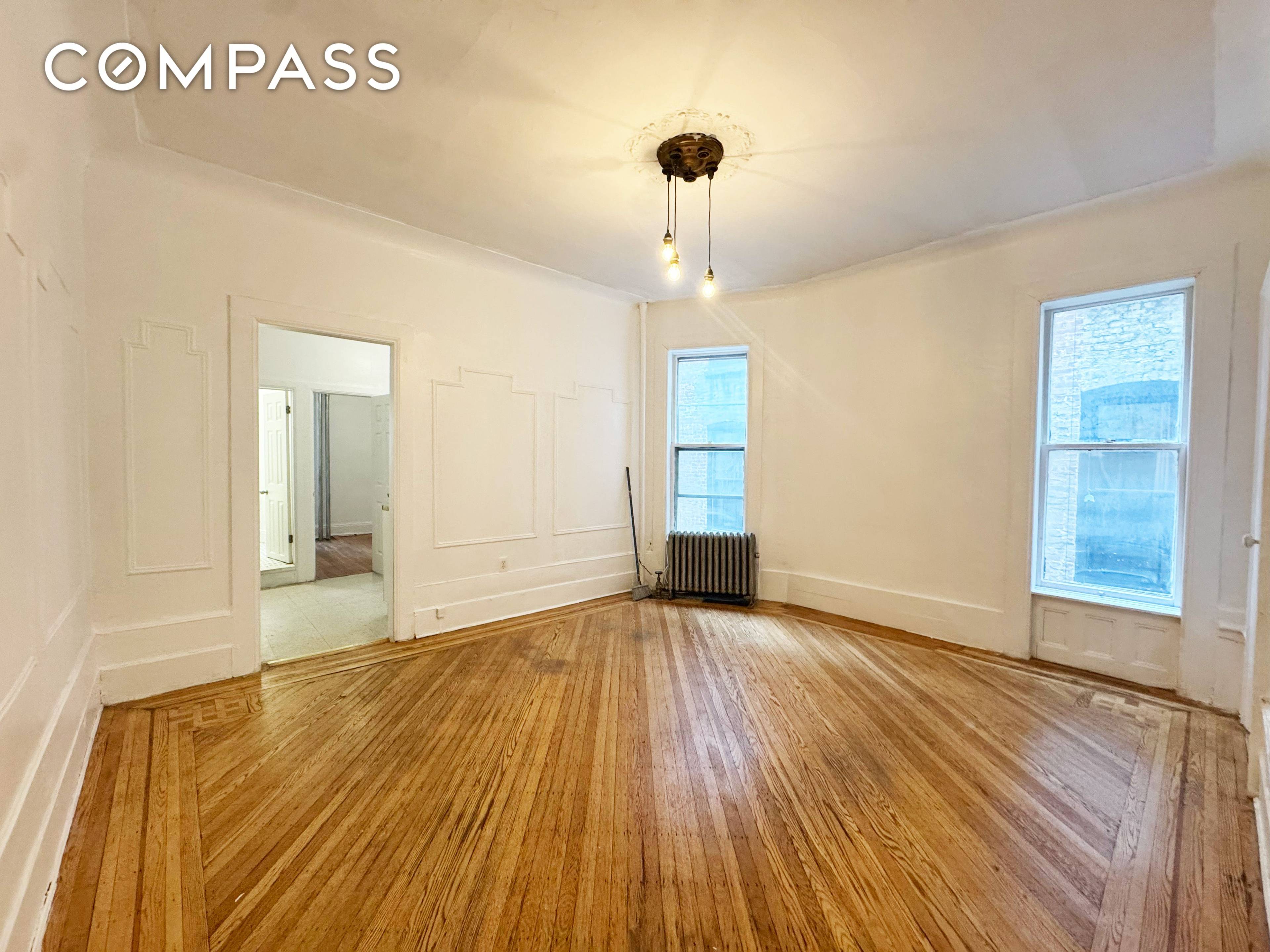 Located in a classic pre war building at 562 7th Street, this bright and inviting 2 bedroom, 1 bath apartment perfectly balances charm and functionality.