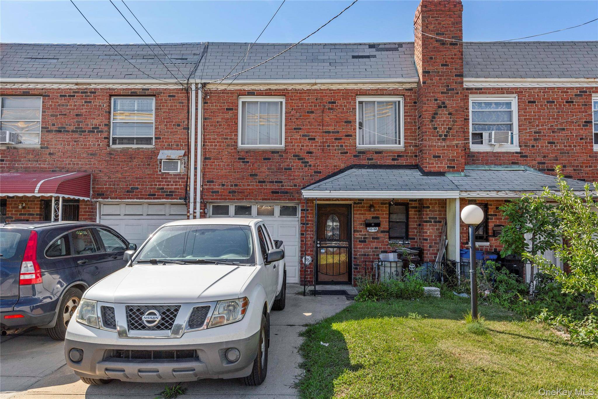 2 Family attached home for sale.