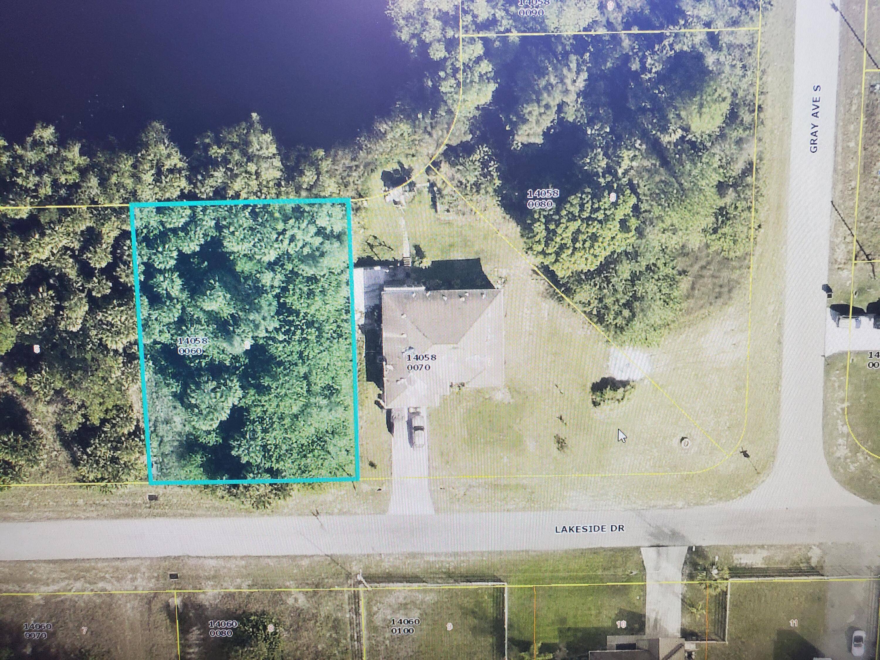 Very nice waterfront lot on paved Rd, High and Dry.