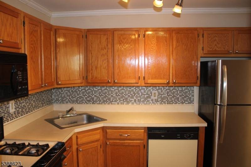 Well maintained and move in ready, this desirable condo unit has Its entrance on the same level as the parking lot, so you can walk easily without any stairs into ...