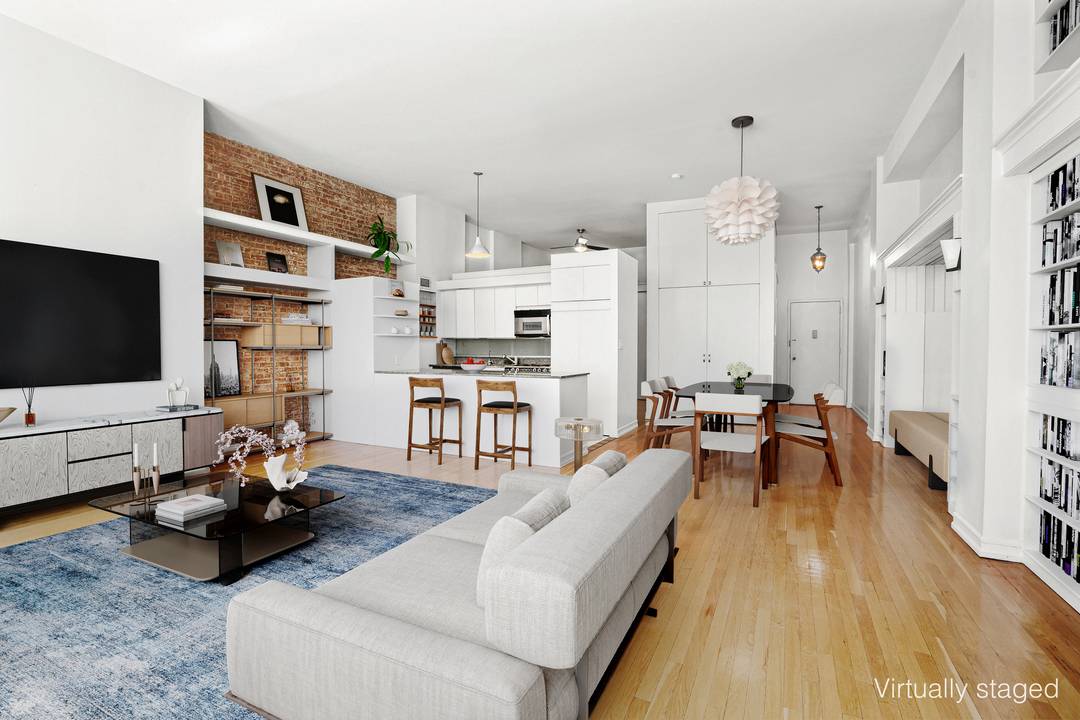 Experience authentic loft living in this rarely available, sun drenched south facing convertible one bedroom loft residence featuring soaring 13'4 foot ceilings, exposed brick walls, oversized industrial style windows, and ...
