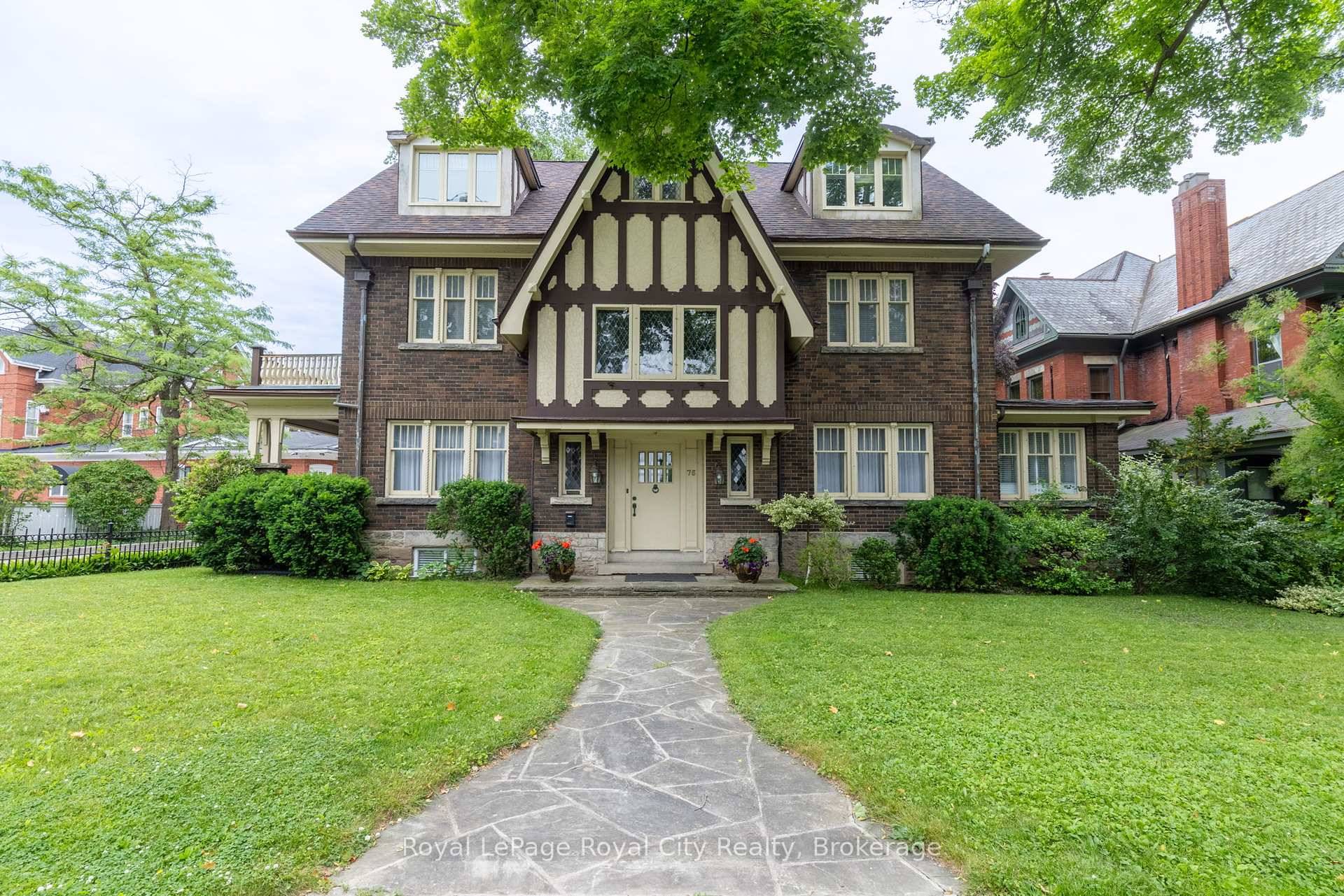 Commanding attention in one of Guelph's most coveted neighbourhoods, this is your rare opportunity to own a truly iconic residence !