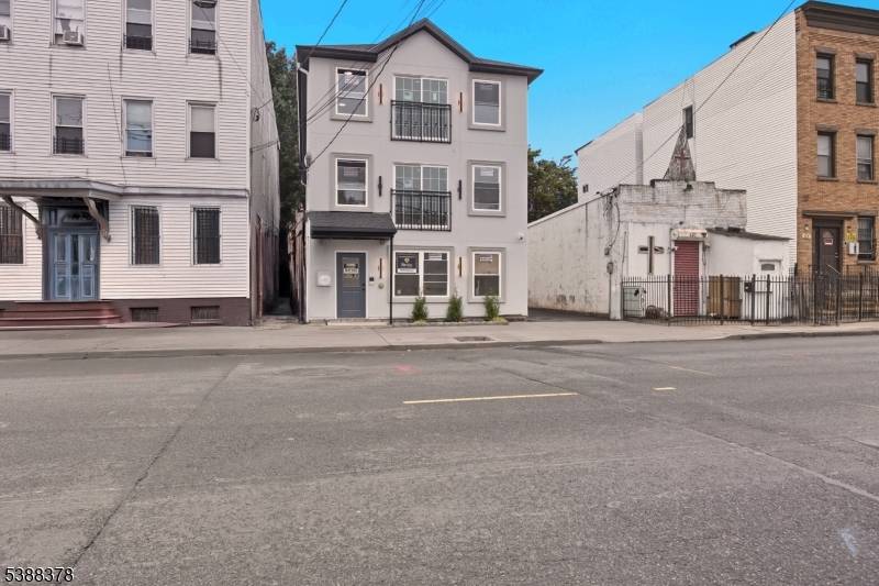 Welcome to 418 Avon Avenue, a brand new three family home in Newark offering modern design and excellent investment potential.