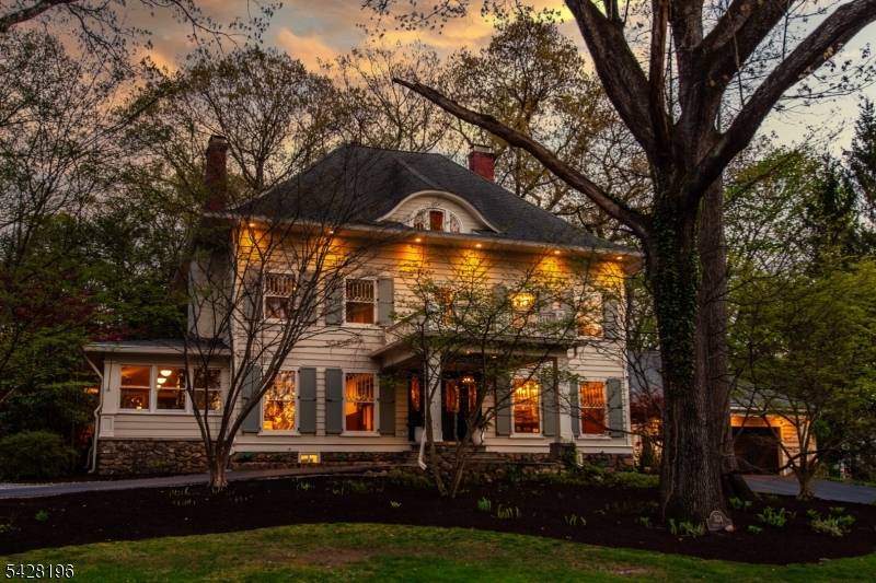 One of Mountain Lakes' most sought after and recognizable homes, this landmark, turnkey property blends presence, history, and modern comfort.