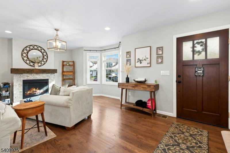Located in the desirable Washington School Section, just moments from the 5 Points area, this beautifully renovated 2019 home offers modern comfort and exceptional space.