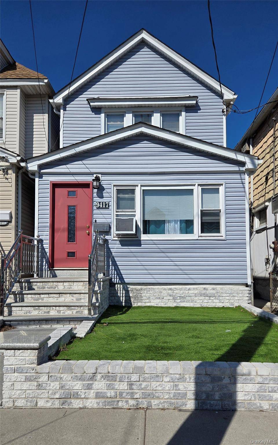 Renovated two family home steps from Cross Bay Blvd.