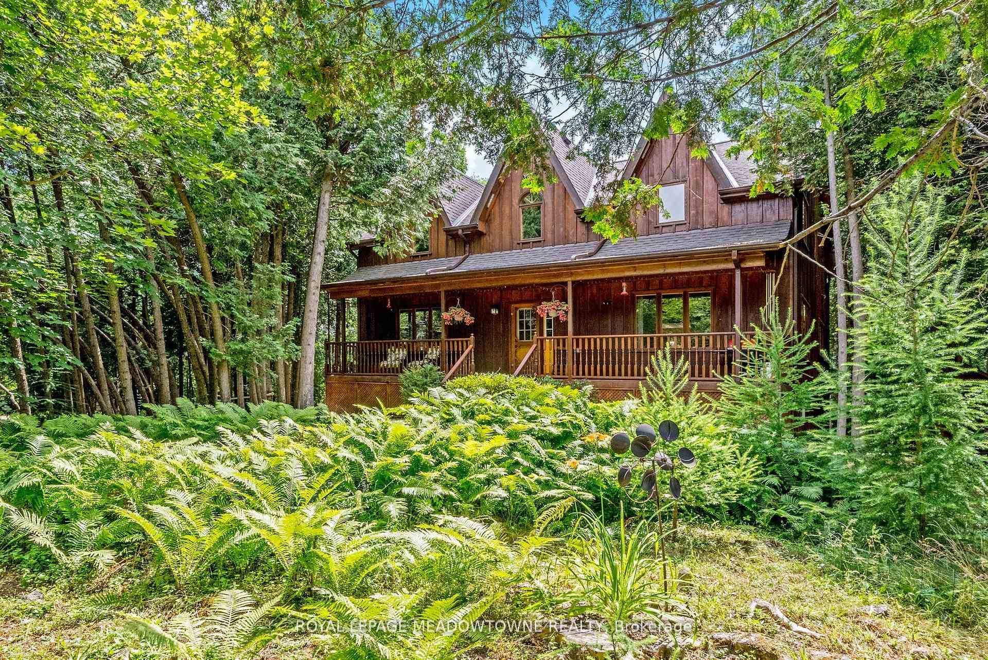 Nestled on a private 1. 7 acre treed lot with a picturesque pond and located on a quiet country road, this unique custom built home is full of charm and ...