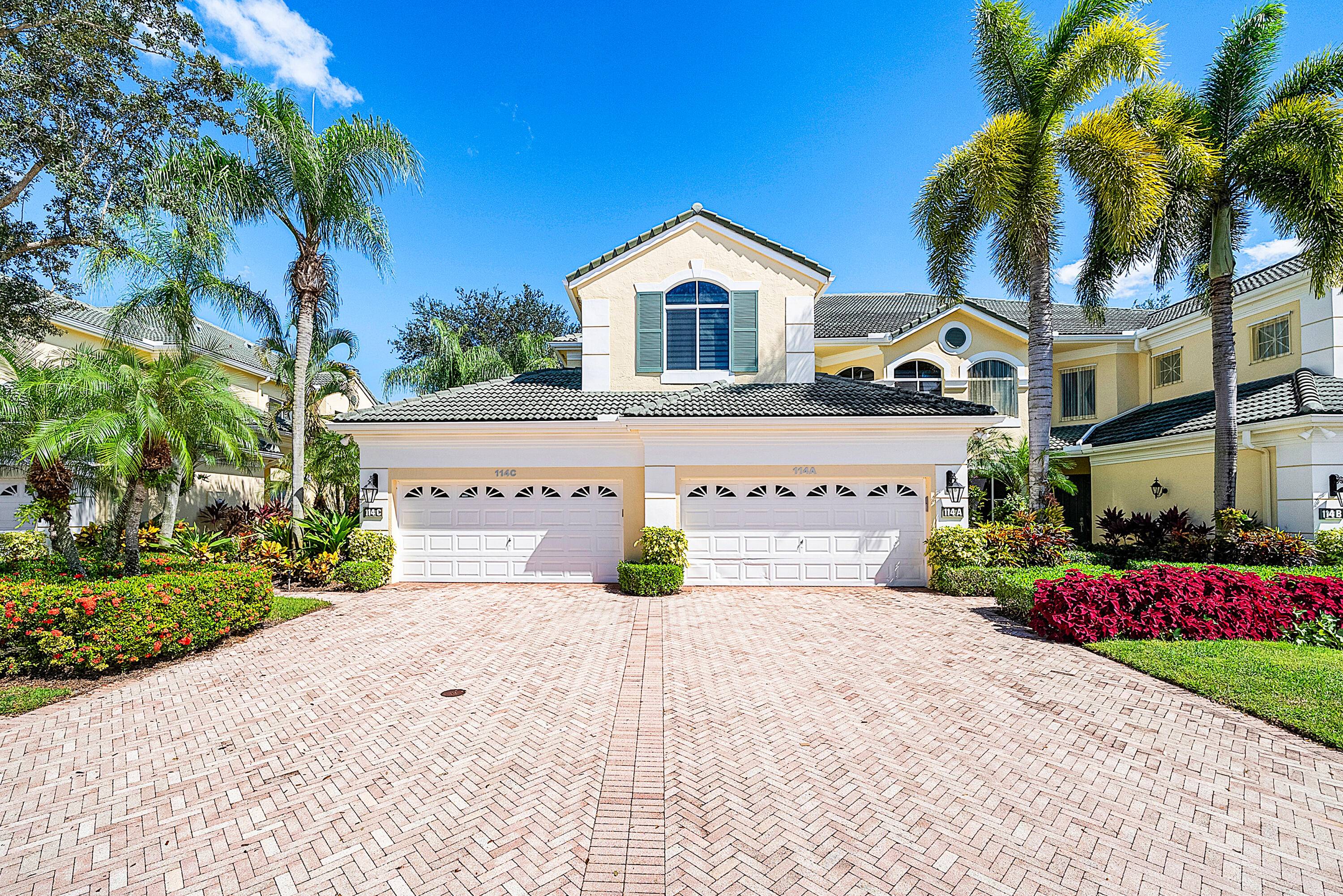 Experience timeless elegance and effortless living in this beautifully maintained second floor condo offering stunning views of both golf and water.