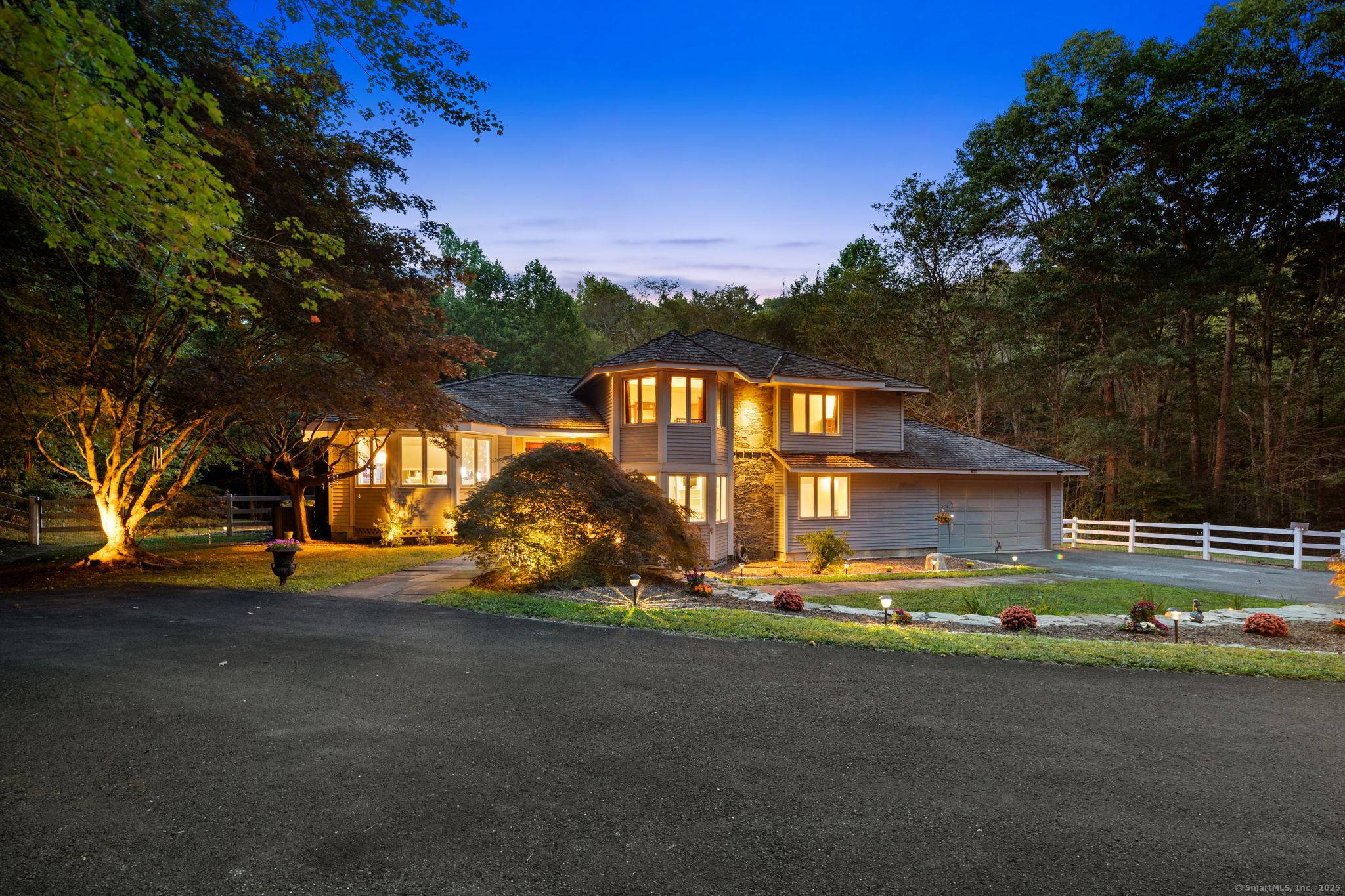 Tucked away in the picturesque hills of Litchfield County, right on the desirable Woodbury Roxbury line, this stunning Colonial Contemporary residence offers an unparalleled blend of privacy, natural beauty, and ...