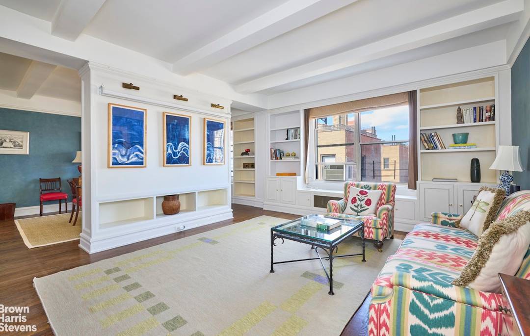 This spacious 3 bedroom plus den office apartment has been masterfully combined weaving pre war details into modern living.