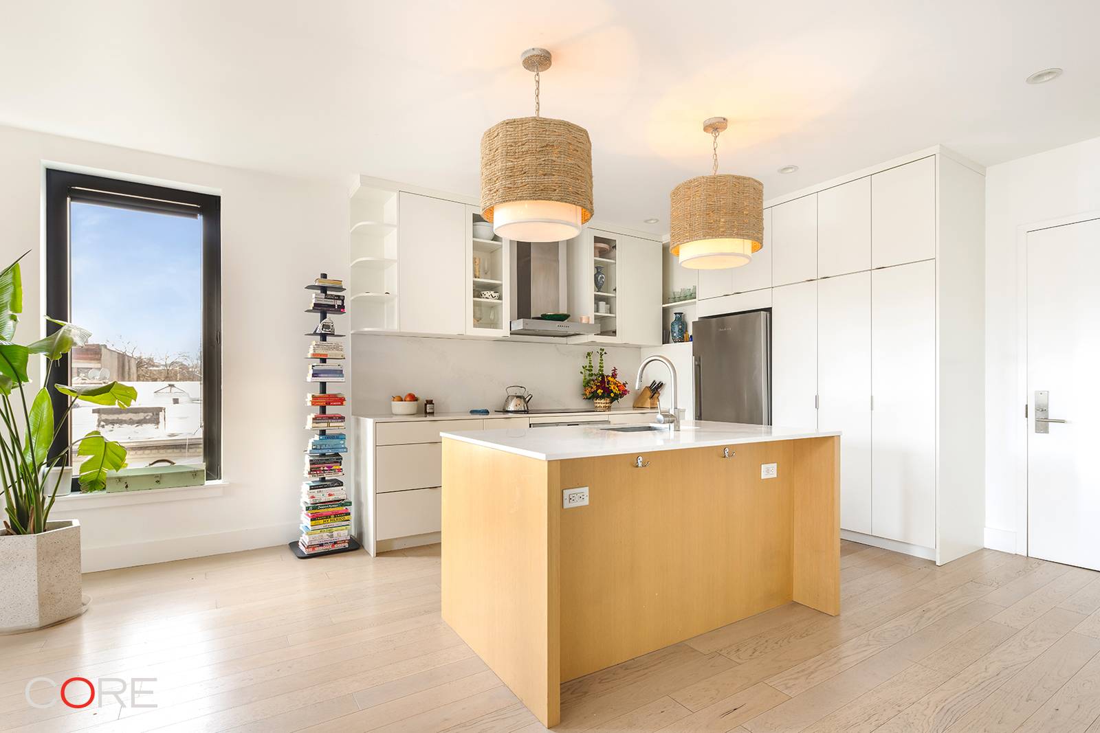 This sleek three bedroom, two bathroom home is located in a boutique, pet friendly Crown Heights building with on site parking, bicycle storage, and a common rooftop terrace.