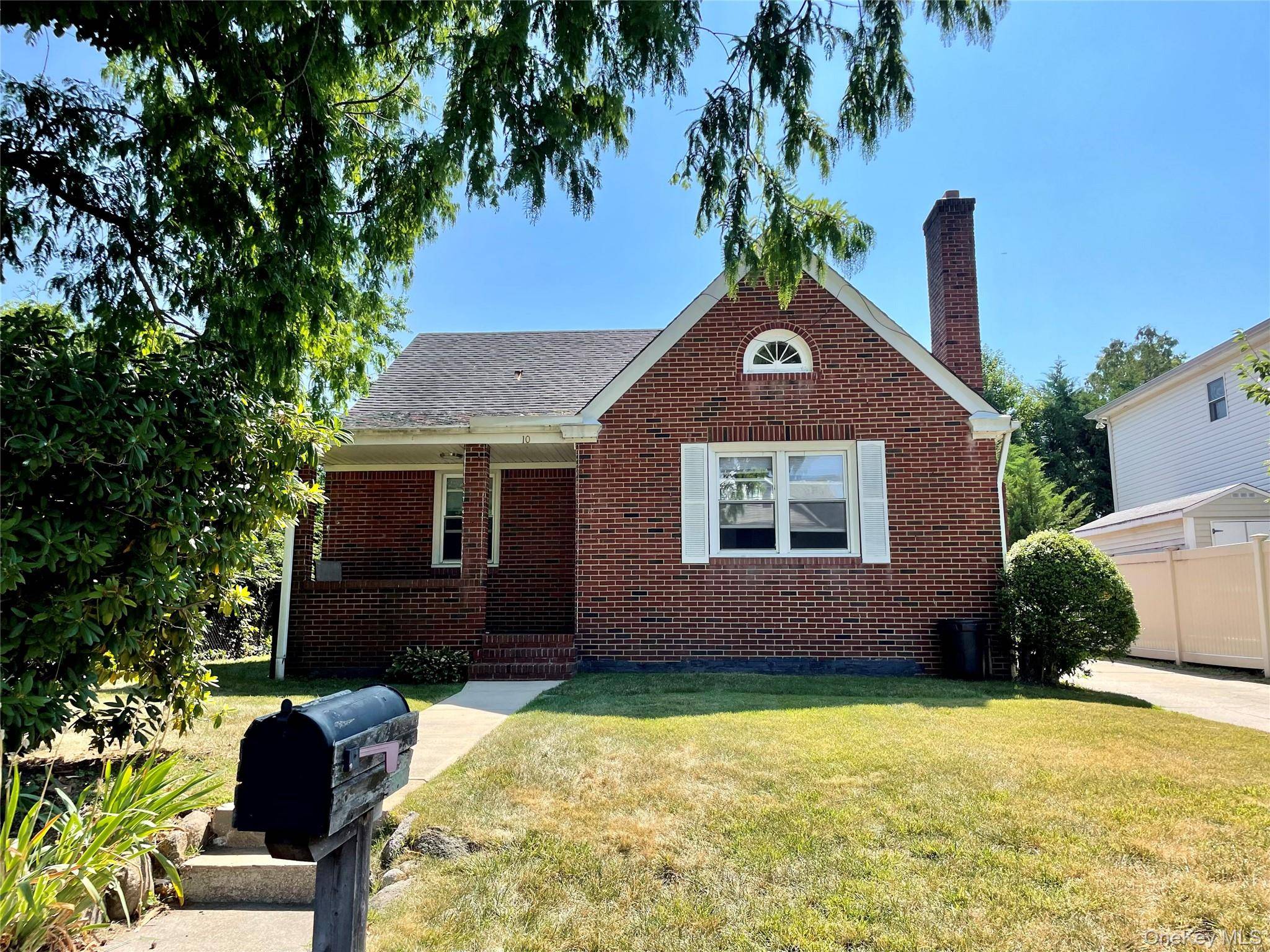 Welcome to this well built brick cape with sweet touches.
