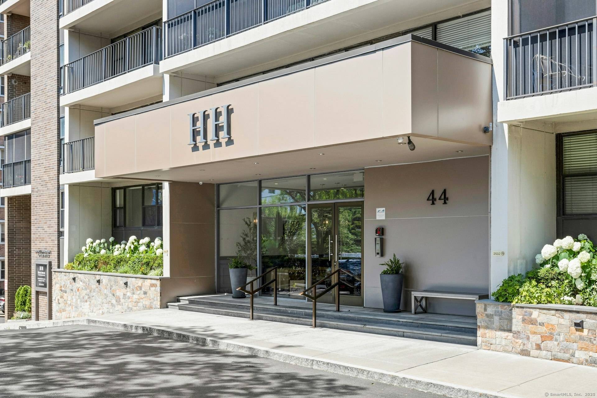 Welcome to this exquisite top floor penthouse a rare corner residence bathed in natural light, offering breathtaking views unparalleled Stamford living.