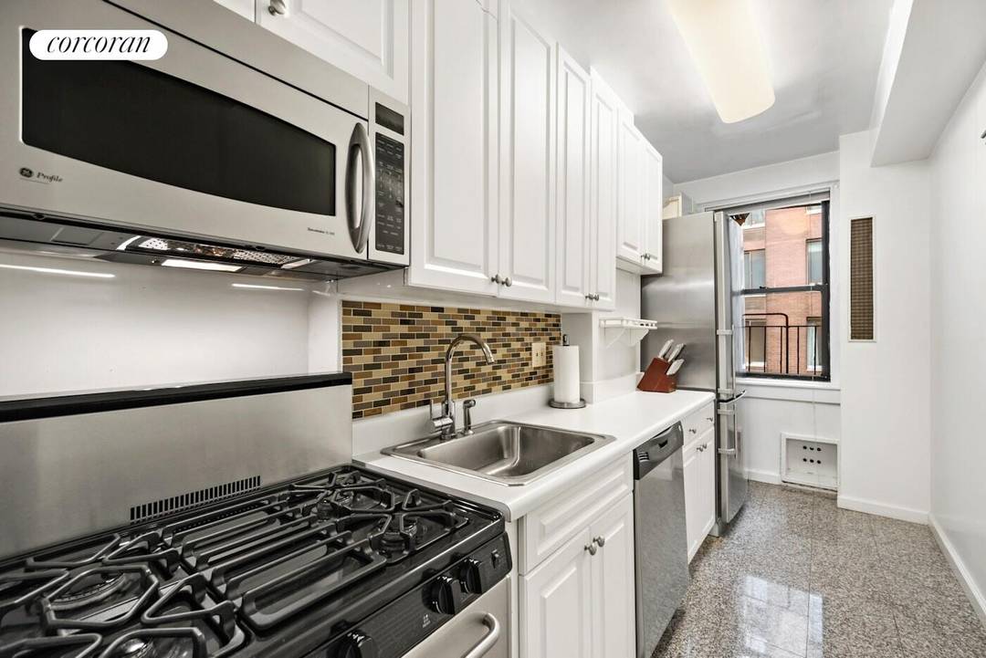 142 East 49th Street, Residence 9E Pre War Charm.