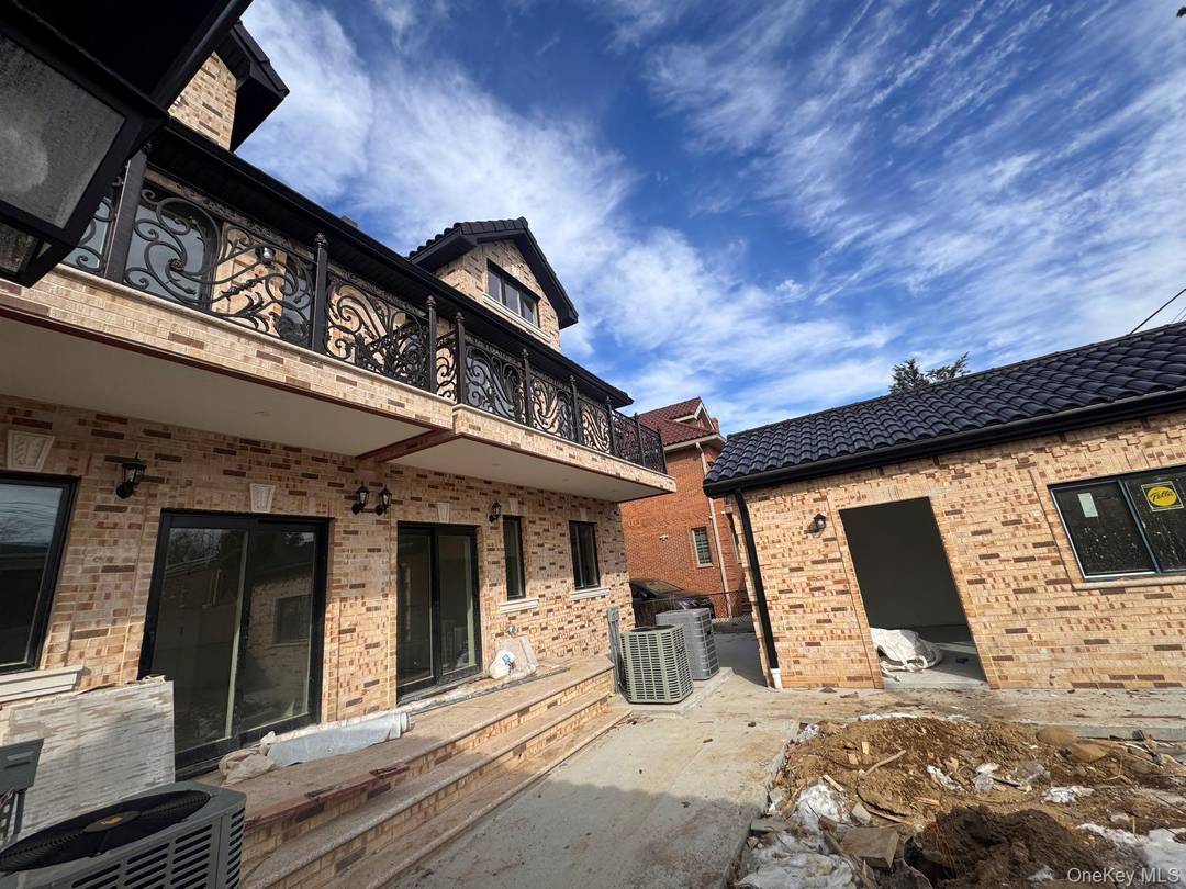 NEW CONSTRUCTION, spectacular, custom built brick 2 family house approx 2100 sqft of luxury workmanship includes a 1056 sqft lower level with 9 ft ceilings finished with the same attention ...