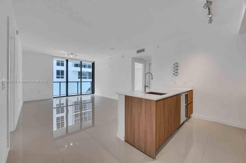 Welcome to 201 SW 17th Rd 302, a stylish residence in Cassa Brickell, a boutique 80 unit building offering privacy, modern design, and urban convenience.