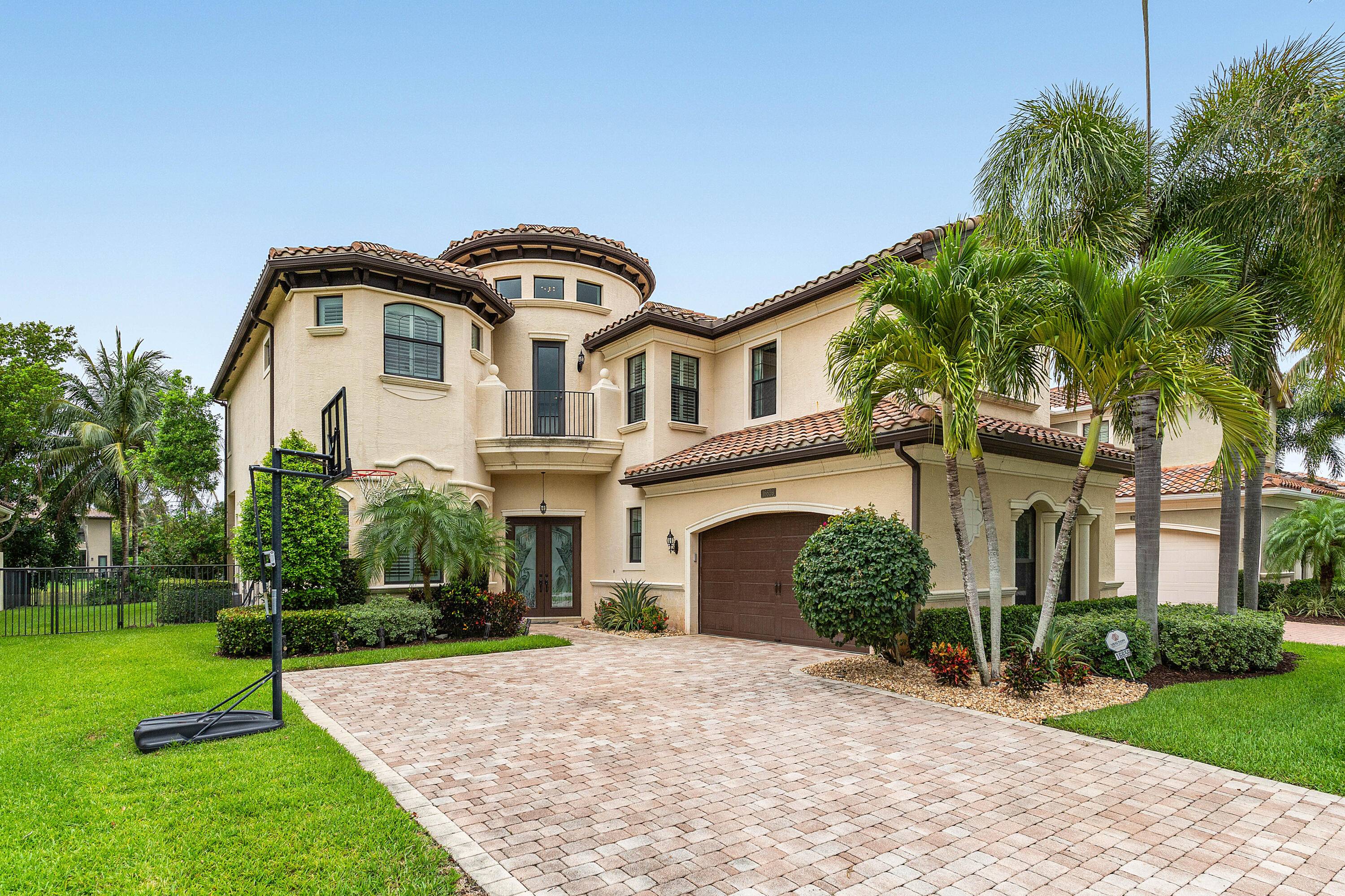 Live in luxury at 16659 Ambassador Bridge Dr, Delray Beach !