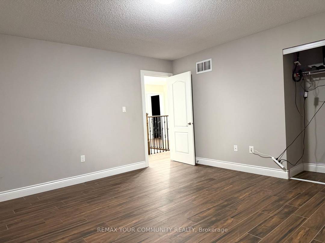 Charming and Bright Detached Home featuring 9' ceilings on the main floor, 4 spacious bedrooms, and an open concept kitchen with premium appliances and a walkout to the backyard.