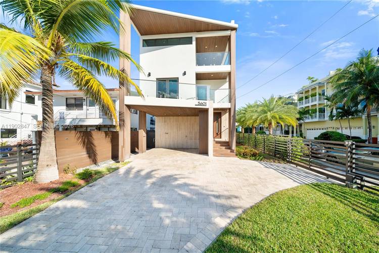 A unique opportunity to own a fully furnished luxury coastal residence just steps from the beach.
