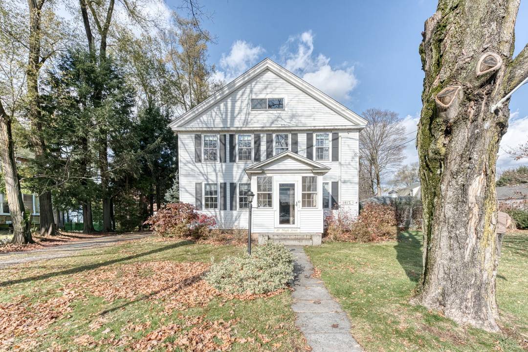 Step back in time with modern comfort at this stunning circa 1837 Colonial located near Ellington's town green.