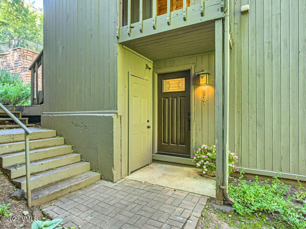 This garden level, south facing residence is located in a park like setting and adjacent to the private pool and tennis courts.
