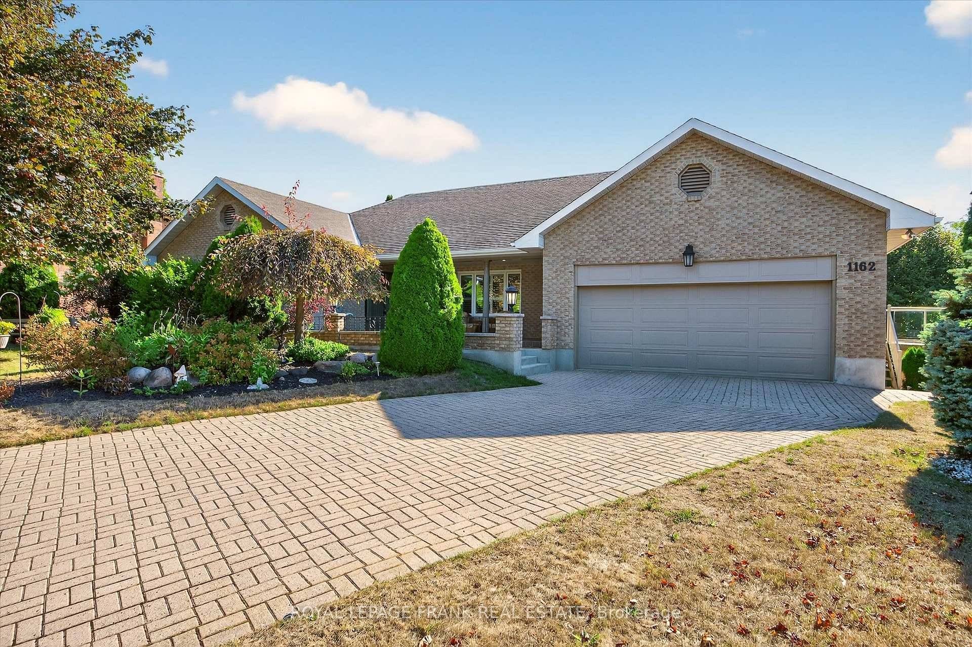 Stunning executive bungalow on one of Peterborough's finest cul de sacs with great privacy in the summer and fall and a spectacular city view when the leaves come off in ...