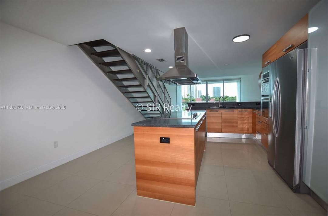 Owner must sell. Stunning 2 Bedroom 3 Bathroom Duplex with Panoramic Water Views Experience elevated living in this spacious duplex, showcasing floor to ceiling natural light and serene water views.