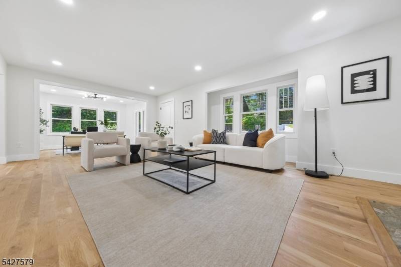 Experience a Modern Tudor Revival where classic architecture meets refined, contemporary design.