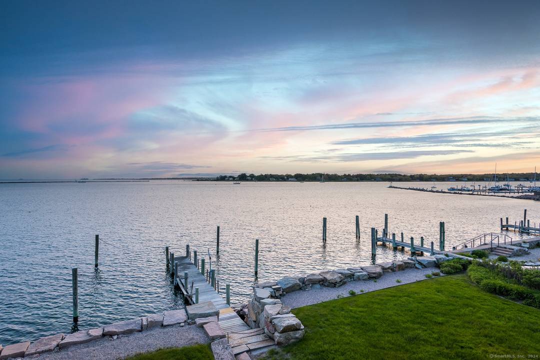 Ideally located in the Borough of Stonington, this four bedroom, three and a half bathroom multilevel home has 50 feet of water frontage and a dock.