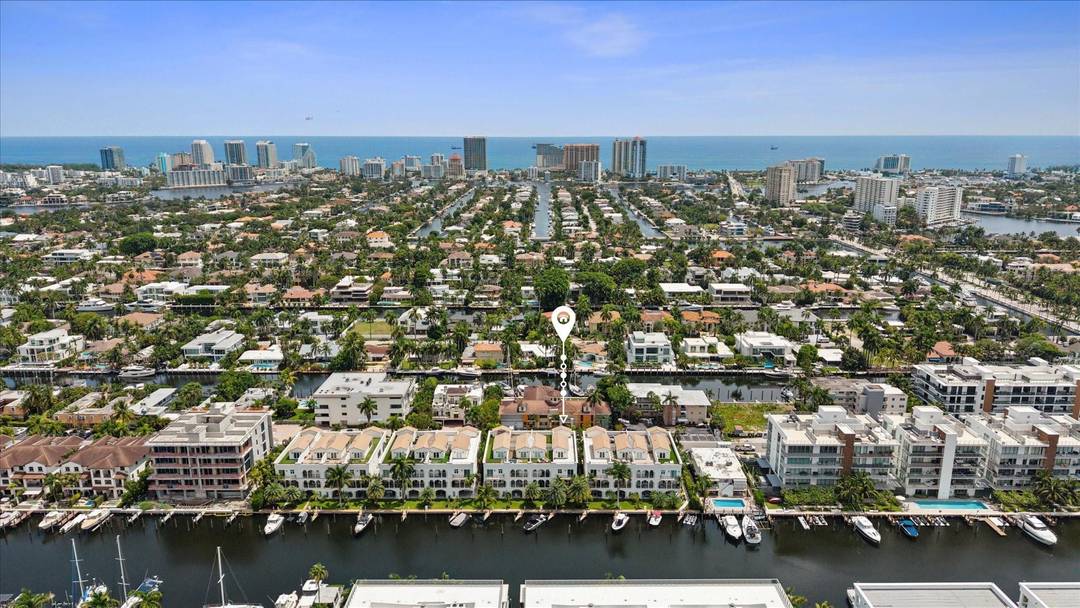 Experience luxury waterfront living in this impeccably maintained townhouse with private slip for 65 vessel and direct ocean access no fixed bridges.