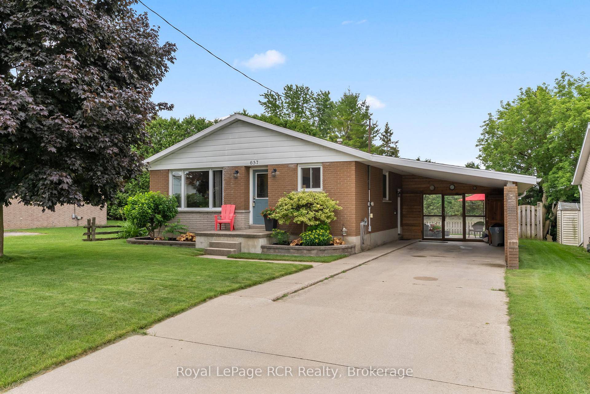 Discover this meticulously maintained brick bungalow, a true testament to pride of ownership.