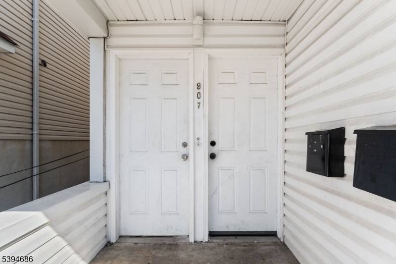 Welcome to this income producing 2 family home in Elizabeth featuring two 4BR 1BA units with renovated kitchens.