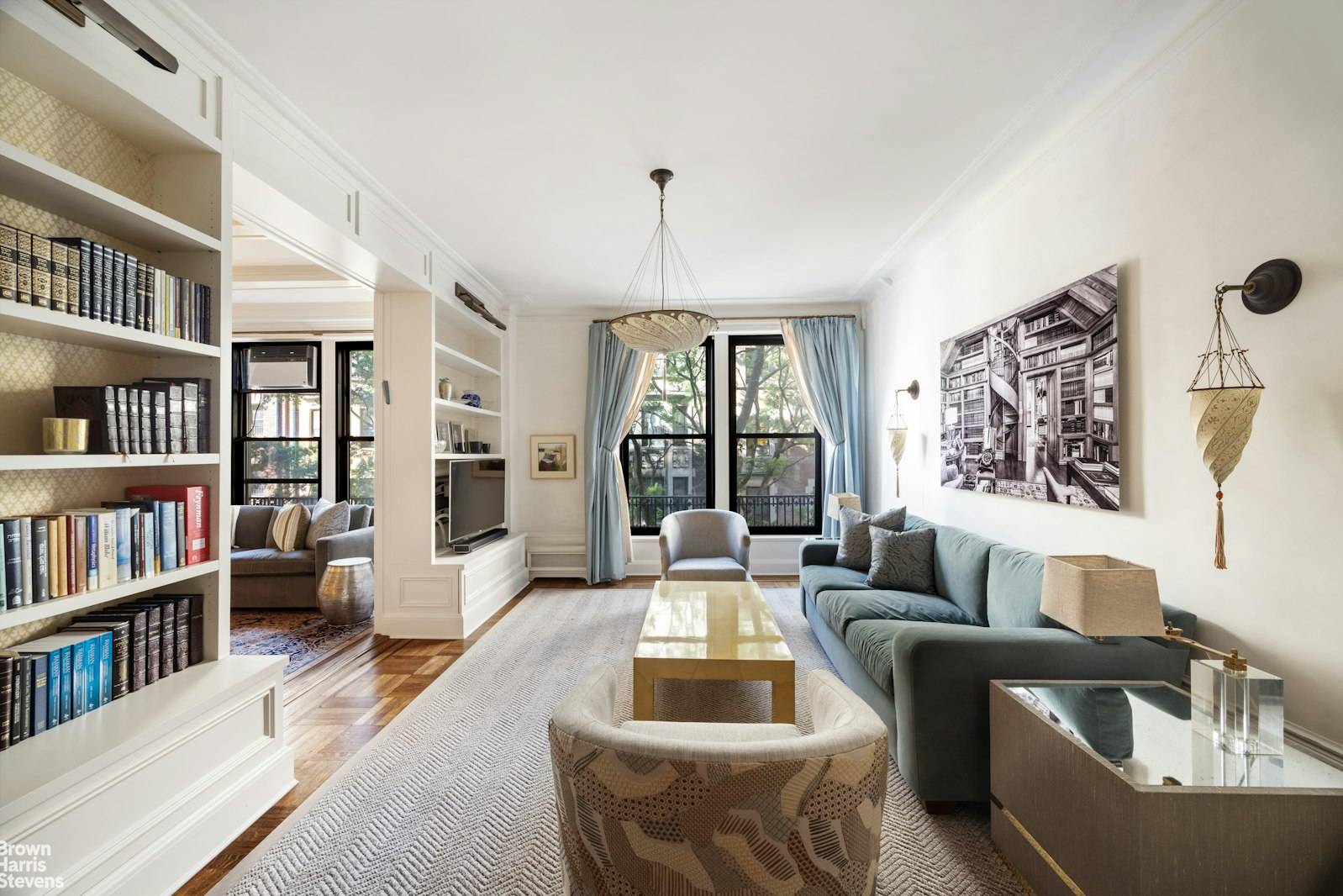 A gracious, turn of the century corner residence offering three spacious bedrooms and a dedicated home office, all within a full service building in a prime Upper West Side location.