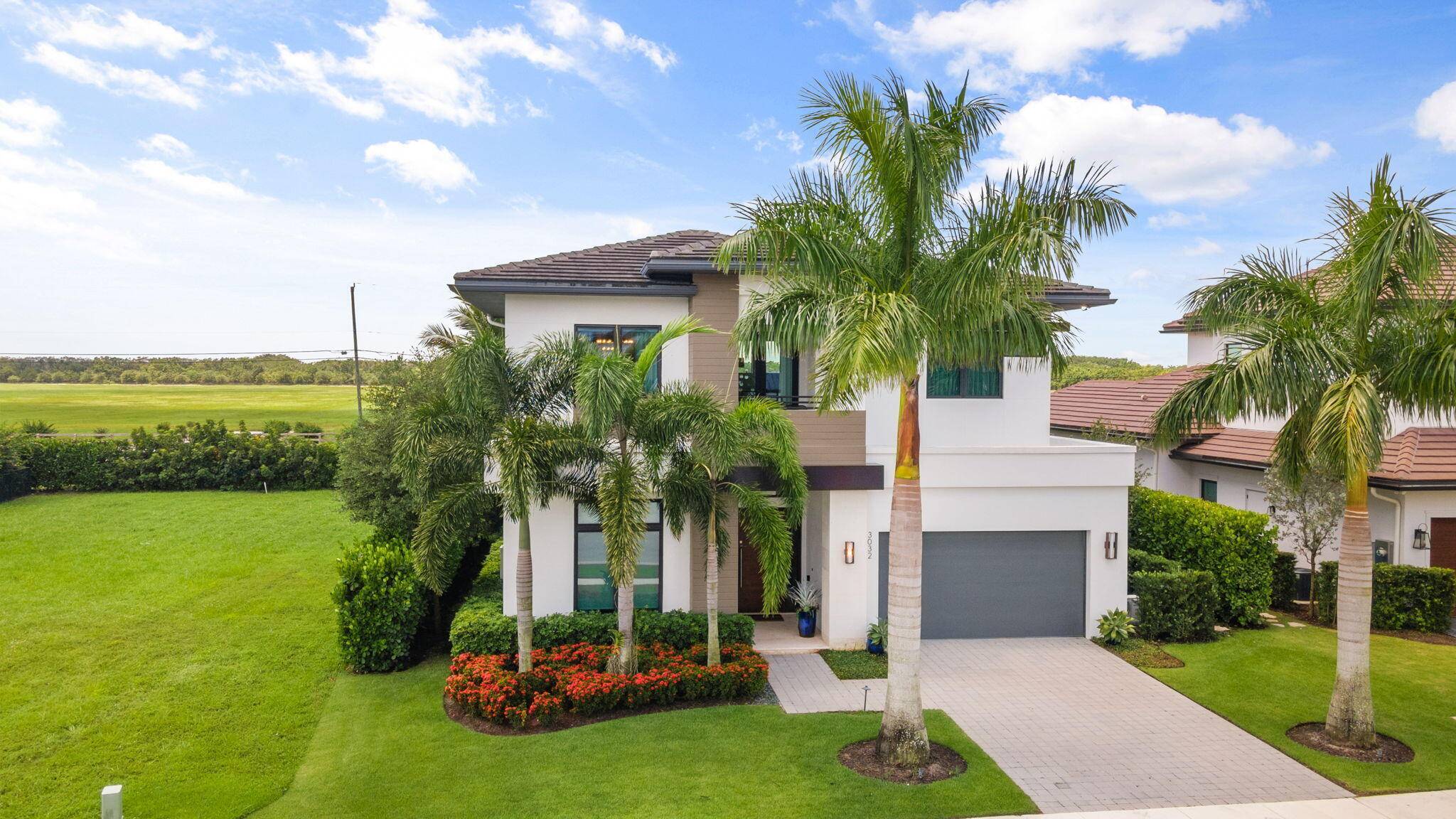 High end newer construction estate located in the exclusive Palm Beach Polo Golf and Country Club.