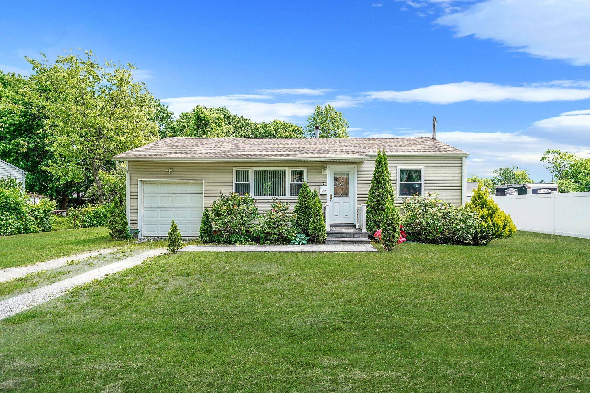 Two bedroom ranch with five year old vinyl siding and roof, new windows, upgraded electric, motion sensor lights, updated doors.