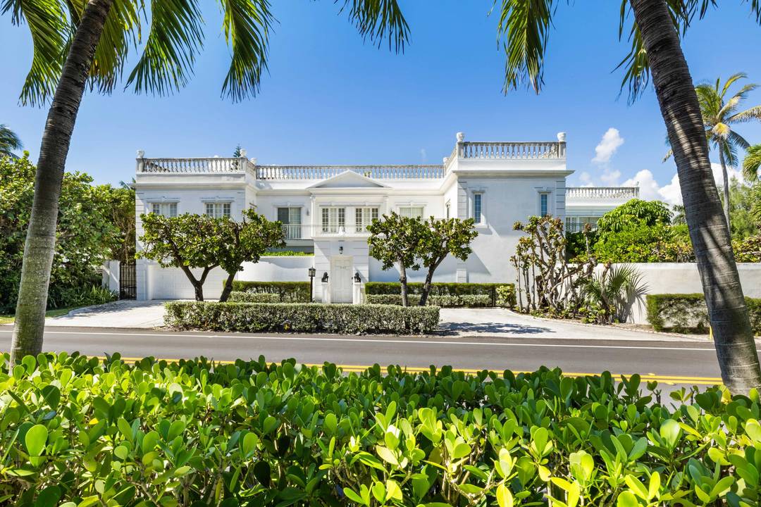 Beautiful John Volk Regency home with ocean views and beach access.