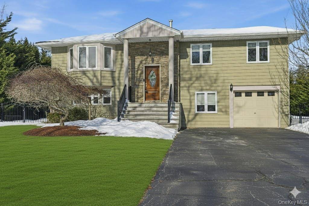 Nestled on a quiet lane in the highly acclaimed Commack School District, this meticulously updated 4 bedroom, 2.