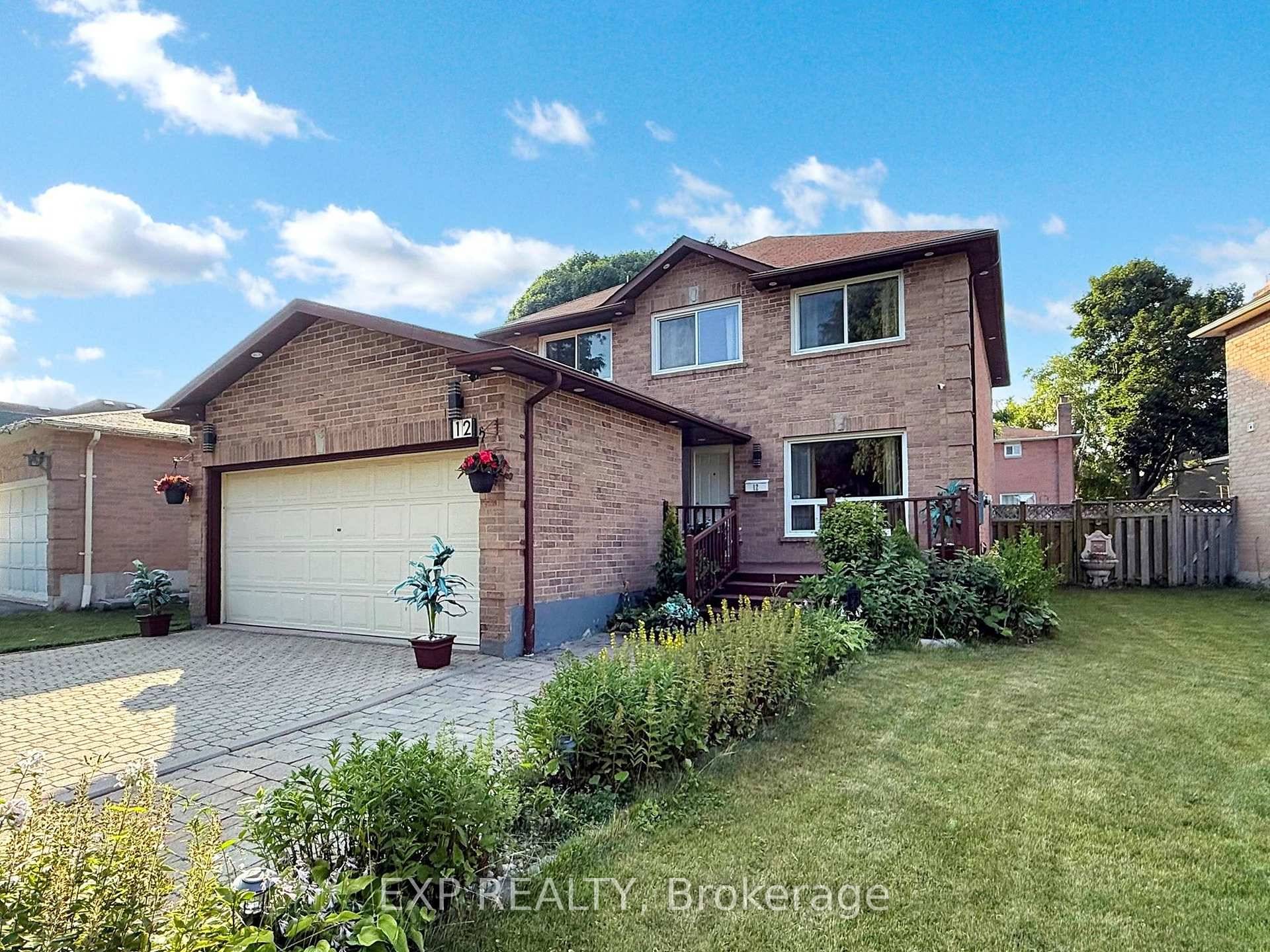 Stunning Freehold Home with double car garage located in a family friendly neighbourhood !