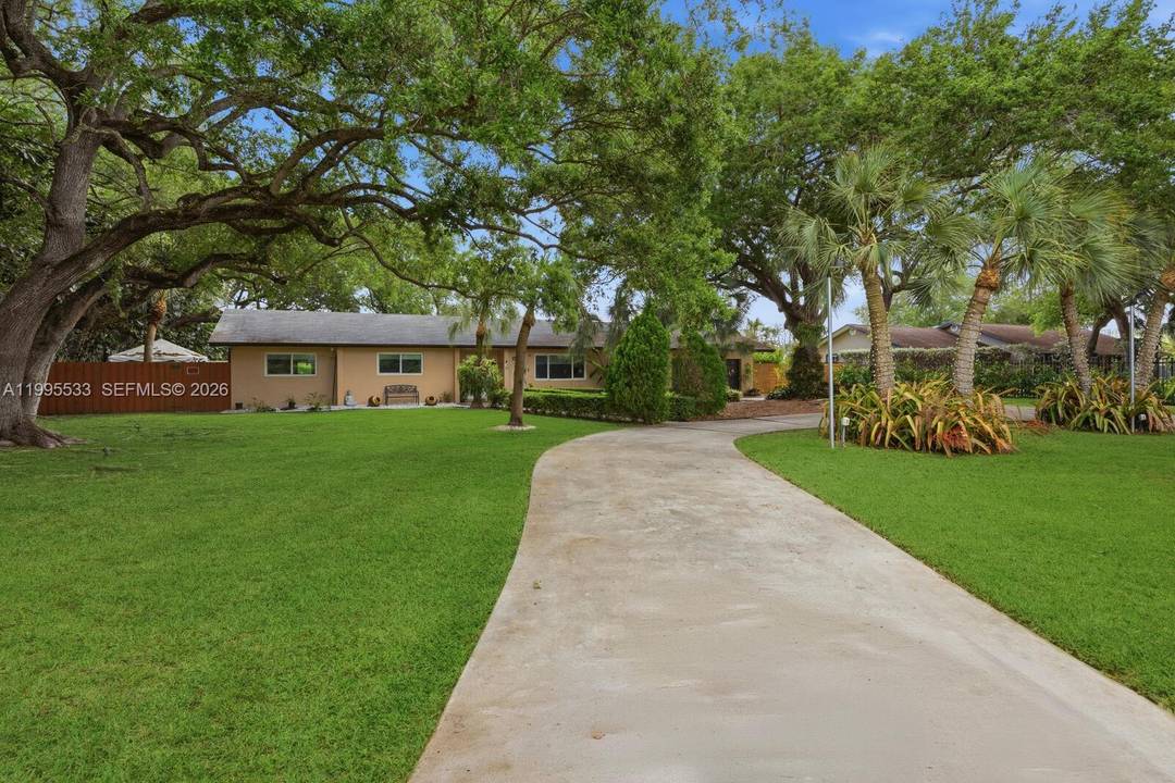 Welcome to your private oasis where space, style, and versatility come together on a sprawling 1 acre lot !