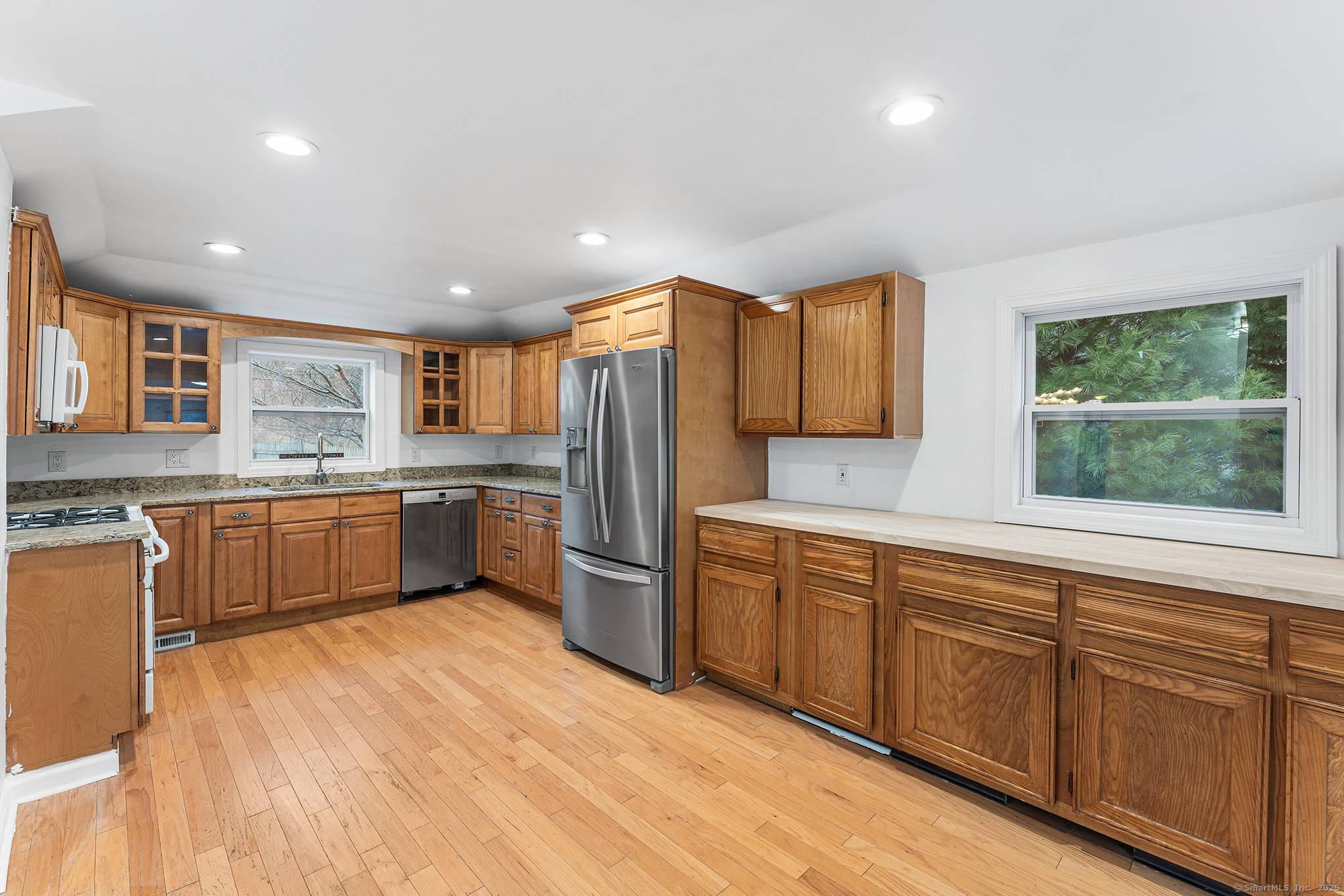 This Charming 3 bedroom, 2 bath Colonial is ideally located close to downtown Weston !