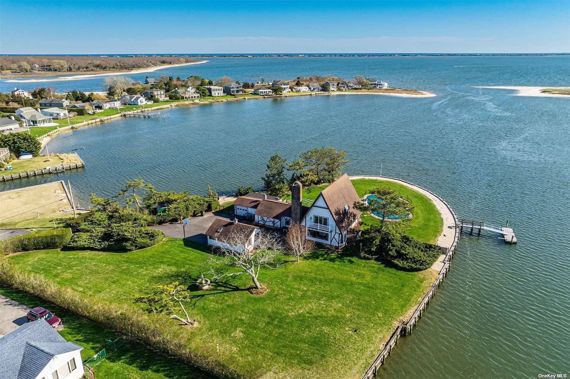 Bayfront Vistas Private Peninsula w Deep Water Dock amp ; Sunsets At the end of a private lane sits this extraordinary double lot waterfront property available for sale for the ...