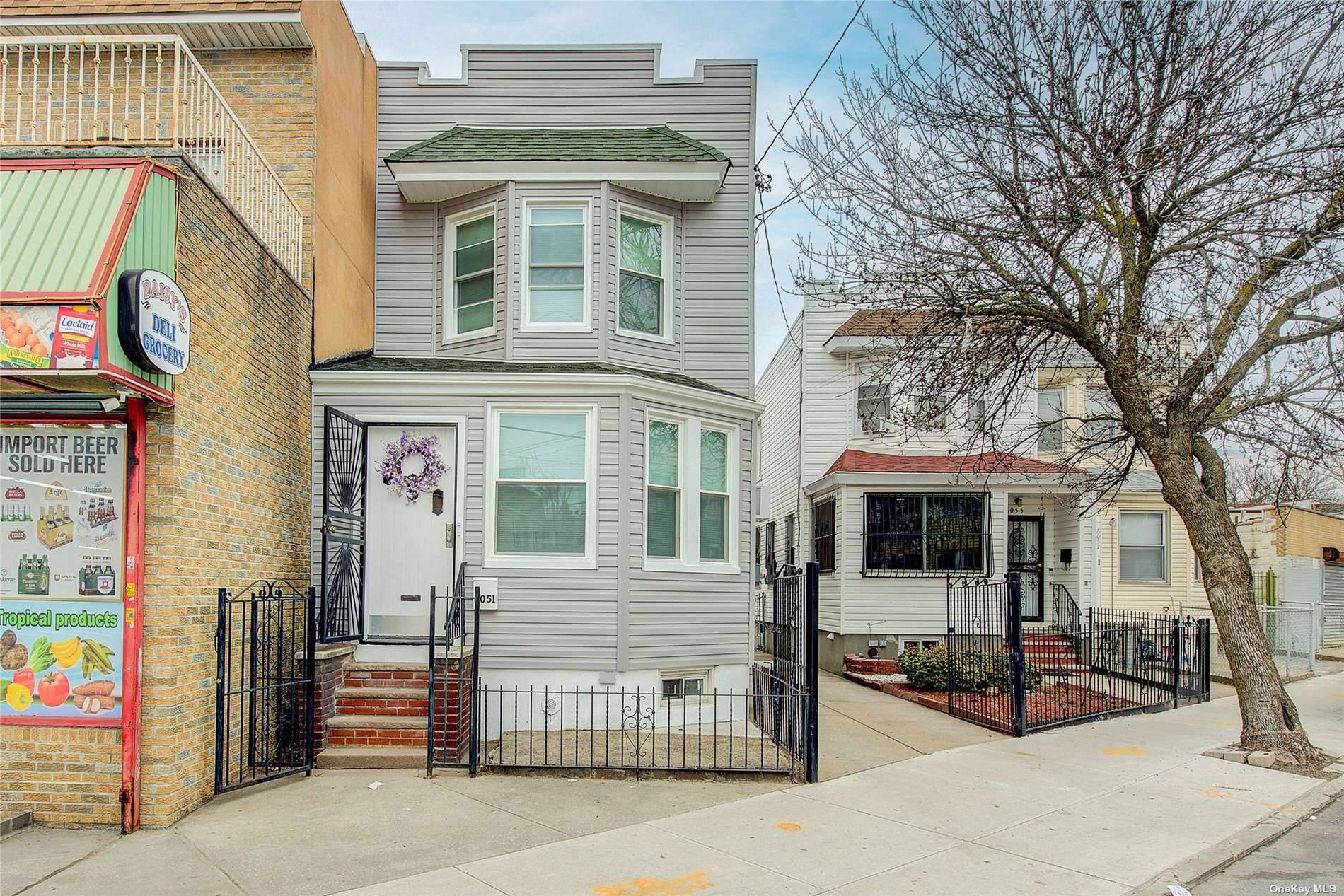 Welcome to this stunning 2 family home that has been meticulously renovated from top to bottom !