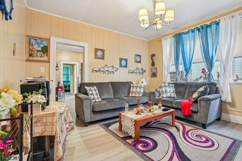 Conveniently located in the heart of Orange, this 4 Unit Multi Family Brick Home is filled with charm and original details throughout.