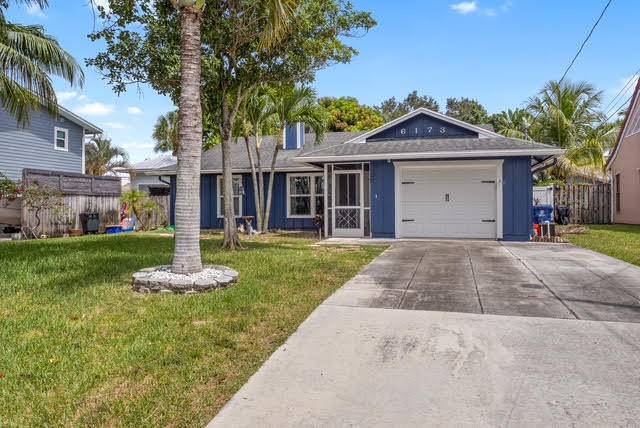 This no HOA home boasts hurricane impact windows and sliding doors, stainless steel appliances and elegant tile flooring throughout then house.