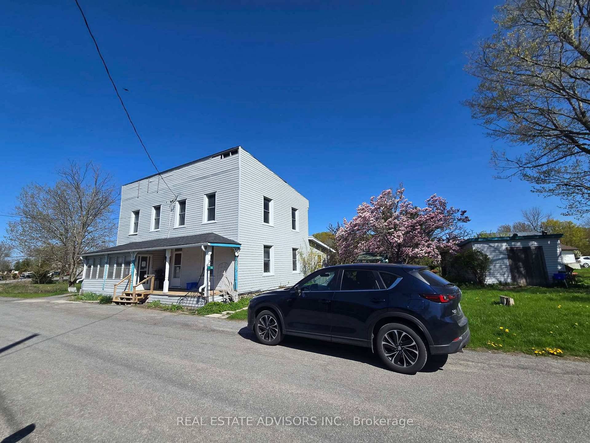 Charming Detached 2 Unit Home Featuring 2 Kitchens, 2 Basements, and Separate Entrances.