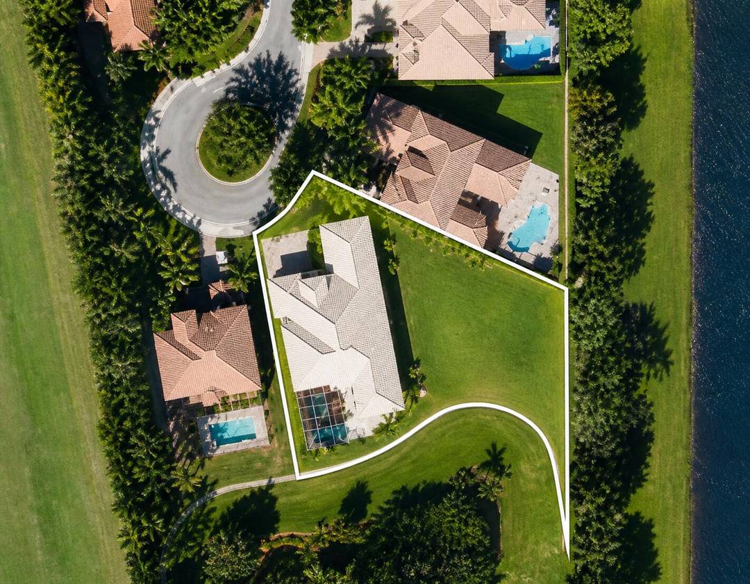 Rare opportunity on an almost 1 2 acre lot with coveted southern exposure and long lake views.