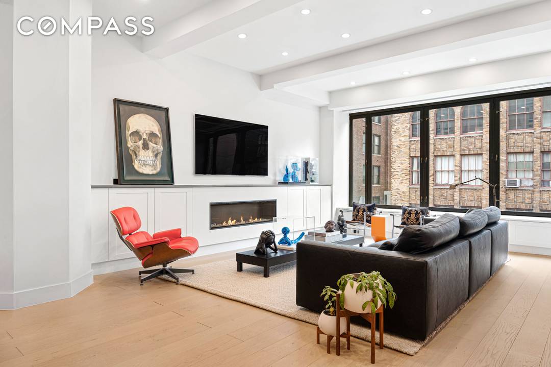 Private and Bespoke Pre War Luxury Loft Welcome to the pinnacle of loft living in this meticulously gut renovated, massive Chelsea residence where pre war character meets modern design.